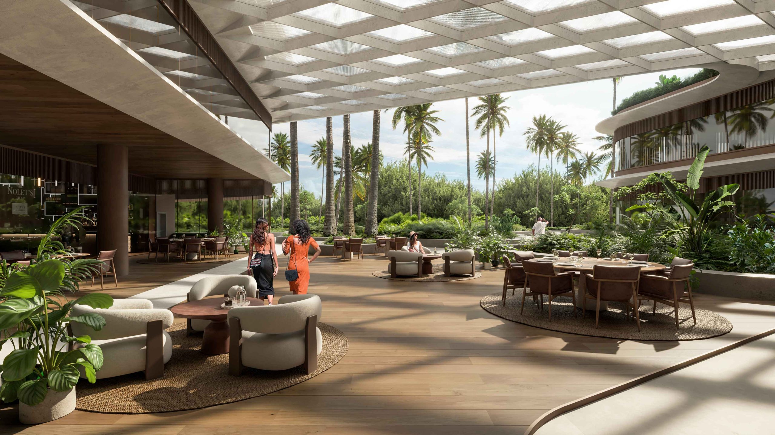 Área social abierta con restaurante y vegetación tropical en Meridiano 18 Cap Cana